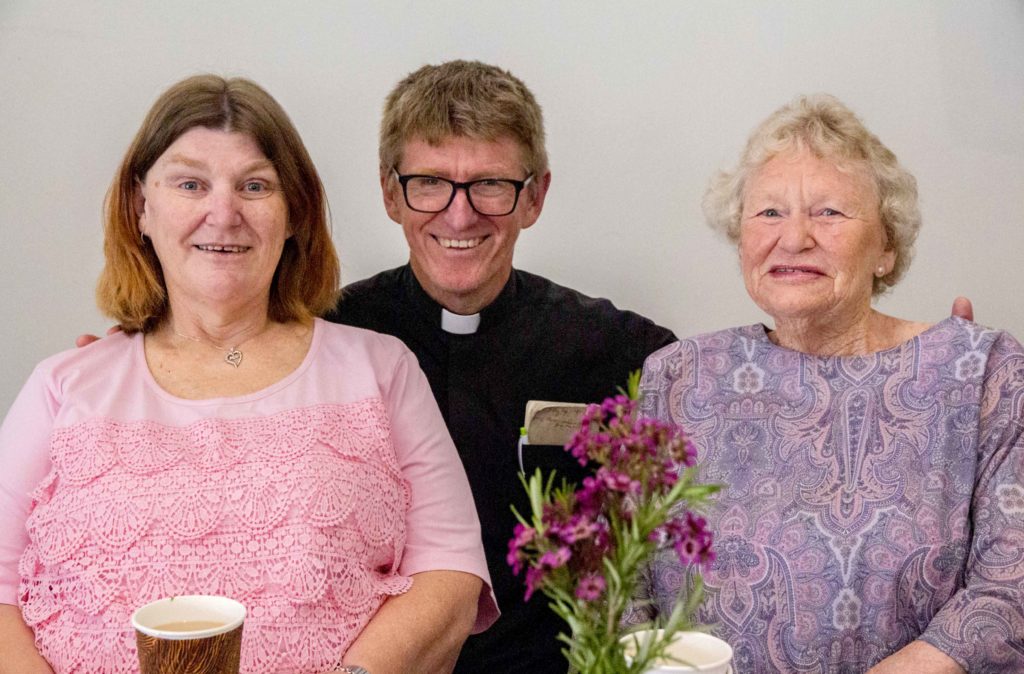 Glendalough Parish Priest Father Douglas Harris reunited with his mother Jean and sister Trisha who travelled interstate for the occasion of his 60th birthday at the Glendalough parish on 20 October. Photo: Amanda Murthy.