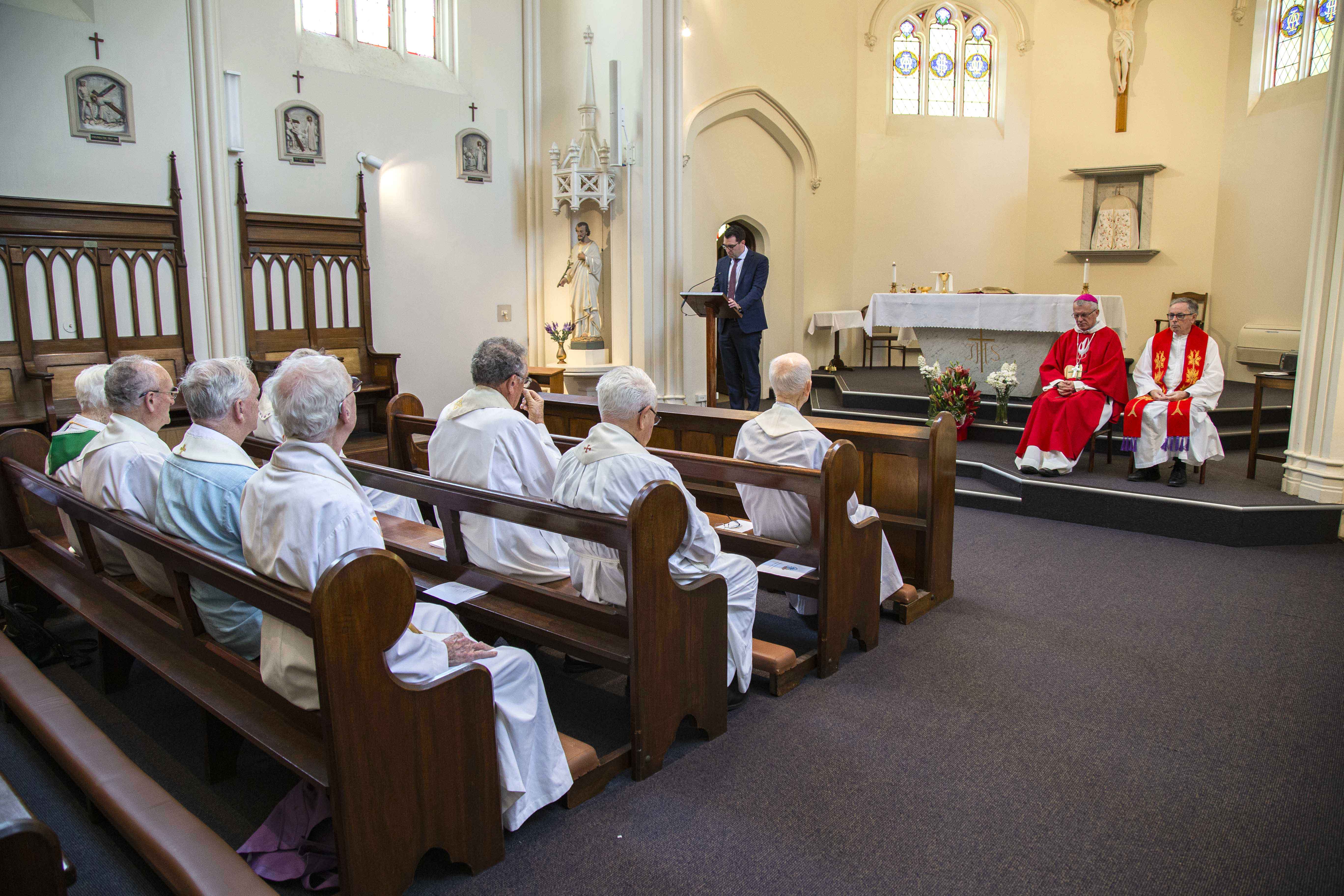 Retired clergy gathered at the Pastoral Centre Chapel, Highgate for an annual Mass and Luncheon with Archbishop Costelloe. Office of the Archbishop Director Daniel Lynch reads the first reading. Photo: Jamie O’Brien.