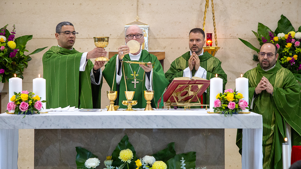 Fr Kenneth concelebrates Mass with Bishop Sproxton and his fellow priests.