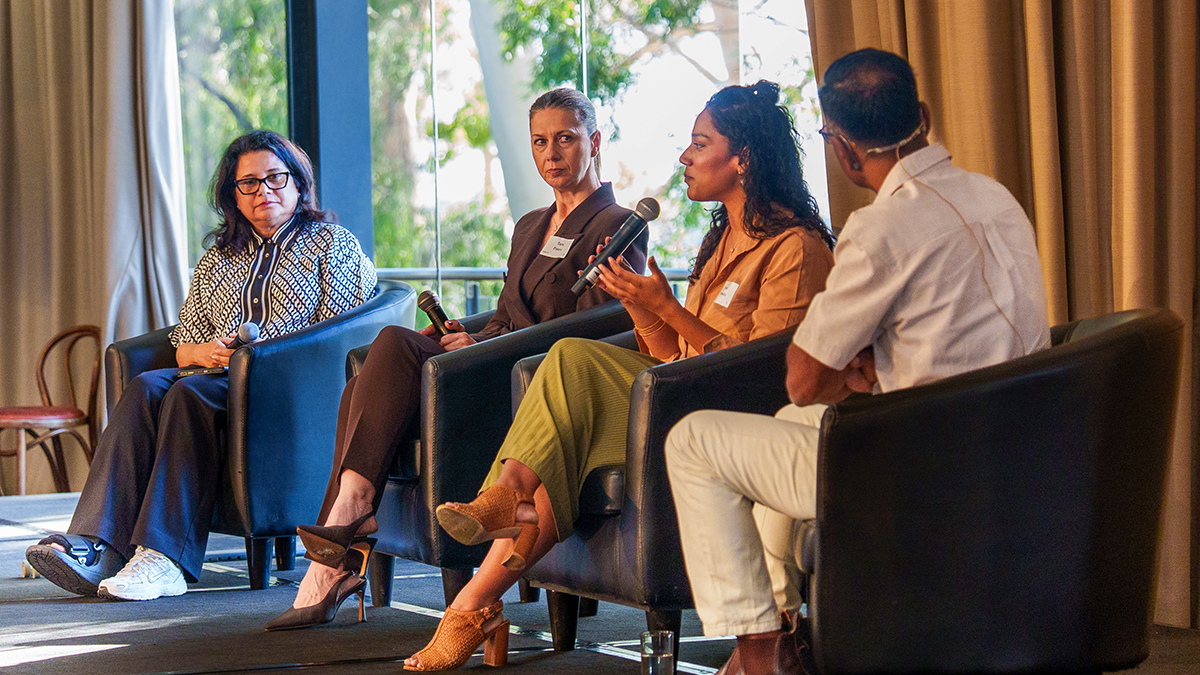(L-R): Debra, Tara and Syona are joined onstage by MC, Nick Marvin. Photo: KSCWA.