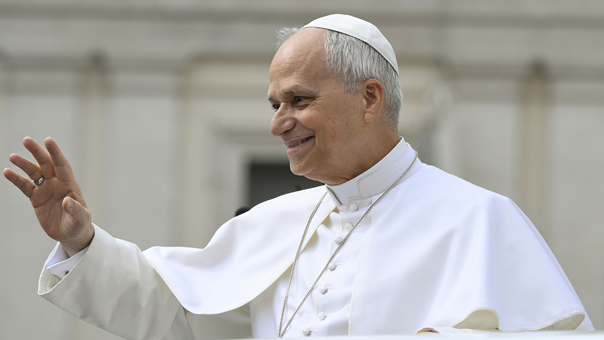 Pope Leo XIV waves to those gathered in St. Peter's Square at the Vatican before leading his weekly general audience on 6 May 2026. Photo: CNS/Vatican Media.