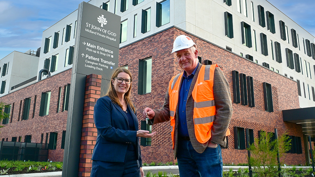 St John of God Midland Private Hospital CEO Vanessa Unwin and Built WA Director, Jon Stone celebrate practical completion of the new facility. Photo: St John of God Health Care.