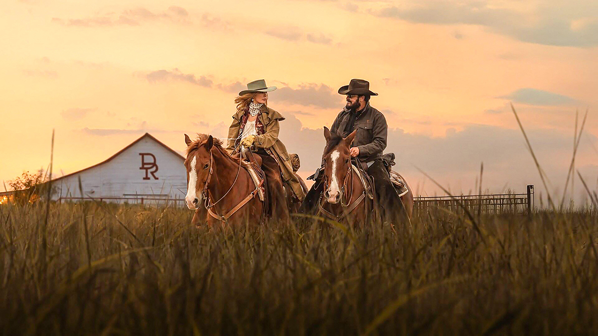 Kelly Reilly and Cole Hauser in a scene from the ©Paramount+ series: Dutton Ranch (2026). Photo: Landmark Media/Alamy.