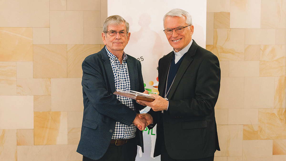 Perth Archbishop Timothy Costelloe SDB presents Ian Smith from Catholic Homes with his award as Employee of the Year at the 2025 Catholic Social Services Awards ceremony at St Mary’s Cathedral, Thursday 8 August. Photo: Infinitum/Archdiocese of Perth.