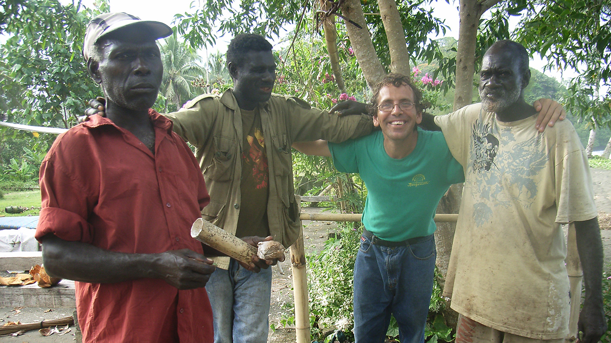 A Palms Australia Volunteer immerses himself in meeting local chiefs. Photo: Supplied/Palms Australia.