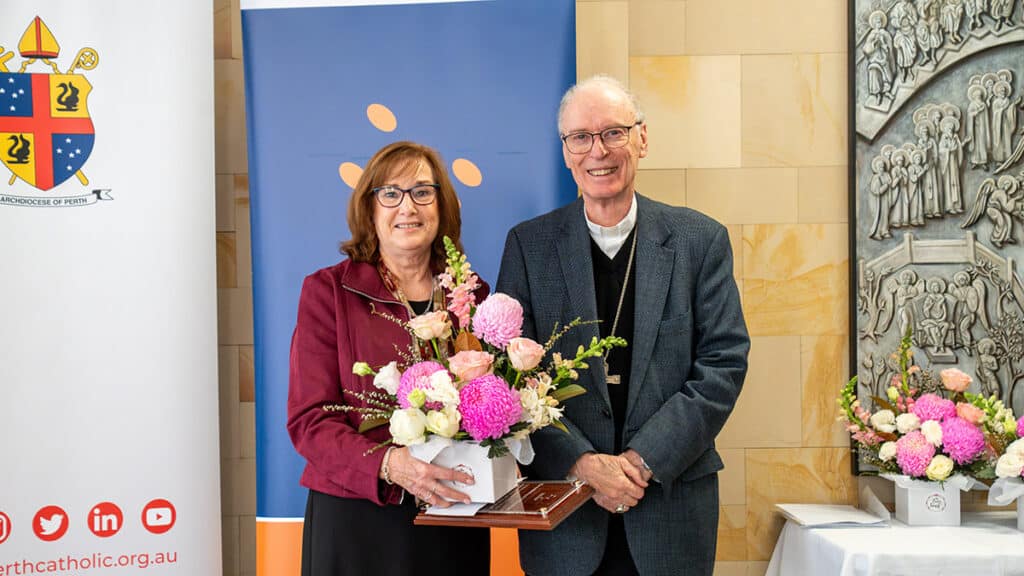 Bishop Sproxton with 2026 CSSWA Staff of the Year Award recipient.