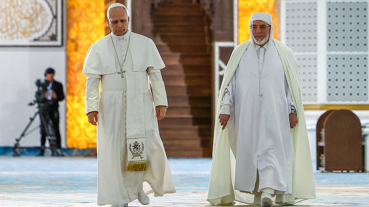 Pope Leo XIV and Rector of the Great Mosque of Algiers Mohammed Al-Mamoun Al-Qasimi Al-Hassani during a visit to the Great Mosque of Algiers (Djamaa El Djazair), in Mohamadia, Algiers, Algeria, on 13 April 2026. Photo: OSV News/Guglielmo Mangiapane, Reuters.