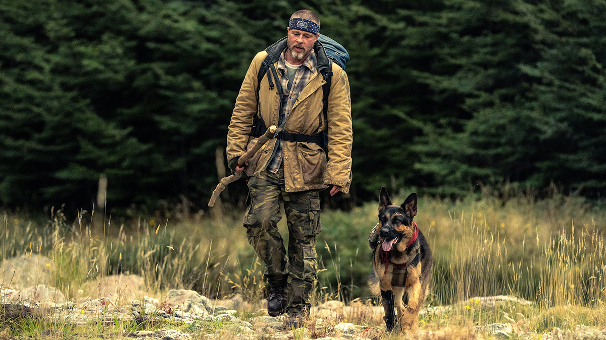 Brad Pitt stars as James Belmont with his dog, Odin, in "Heart of the Beast" from Paramount Pictures. Photo: OSV News/Scott Garfield, Paramount Pictures.