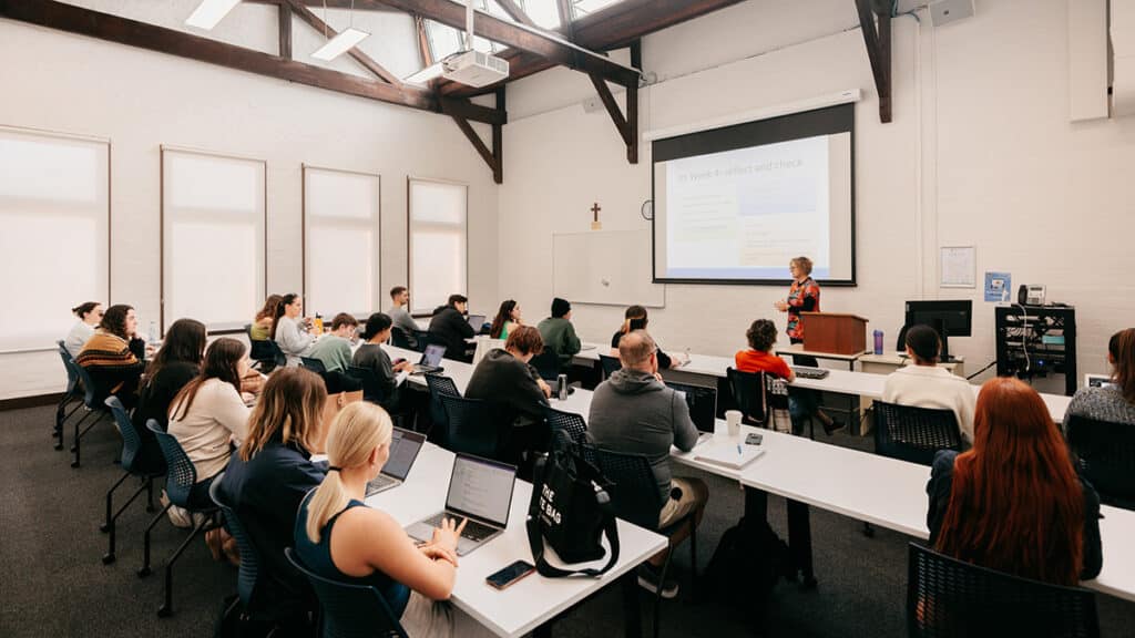 Students listening to a lecturer at the University of Notre Dame Australia Fremantle Campus.